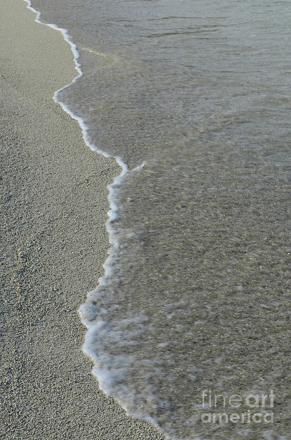 Waves Gently Rolling Ashore in the Soft Sand Photograph by DejaVu Designs