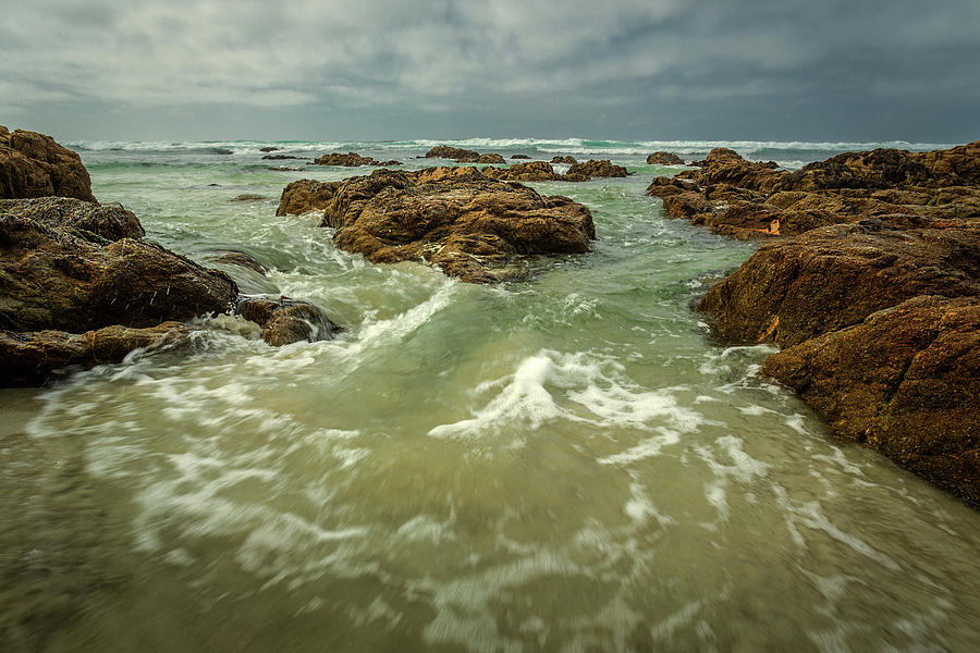 Waves over Boulders Photograph by Rick Strobaugh