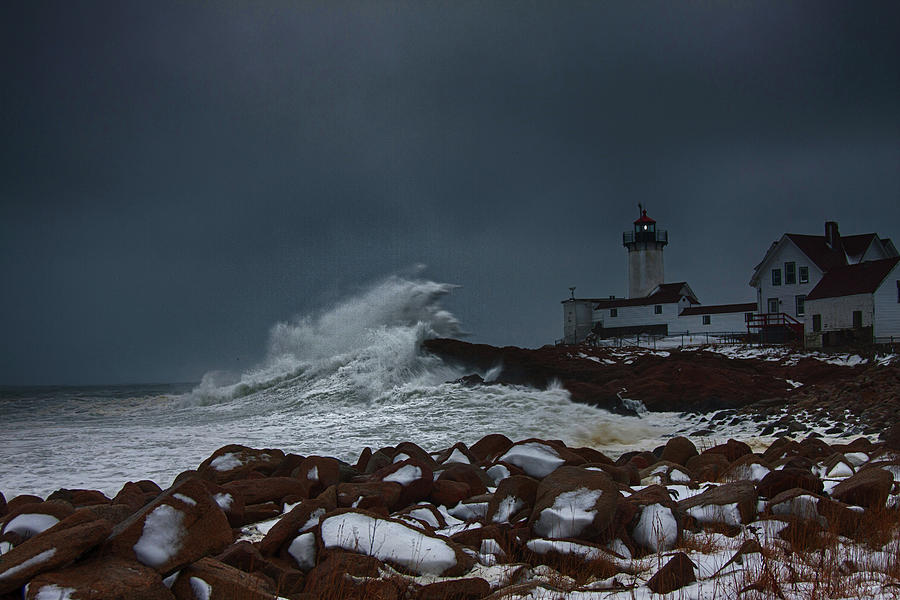 Waves reaching for Eastern Point Lighthouse Photograph by Jeff Folger