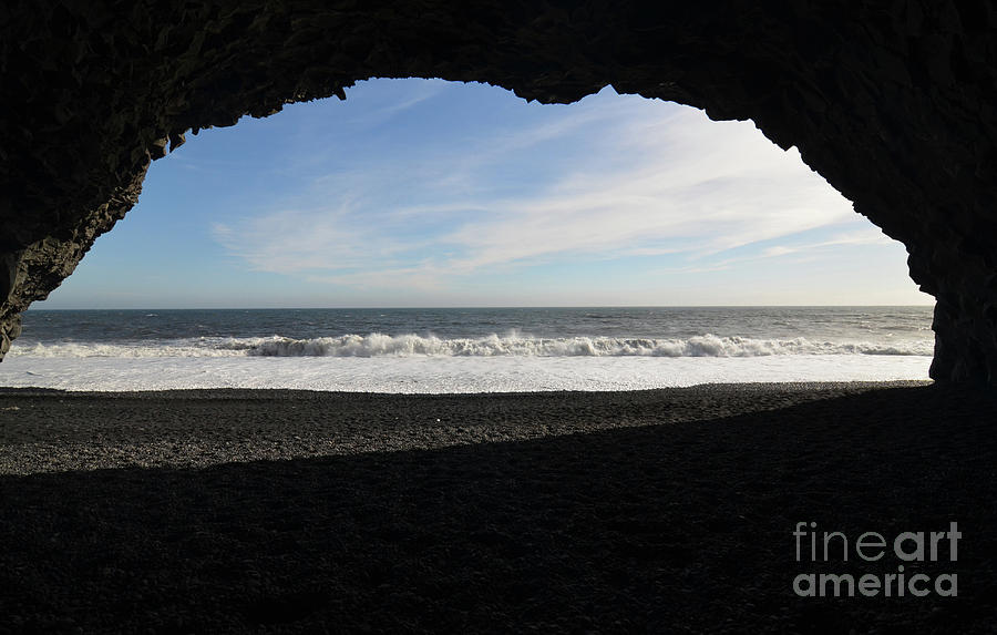 Waves Rolling Ashore as Seen from a Cavern on Reynisfjara Beach Photograph by DejaVu Designs