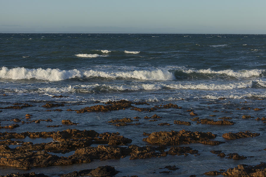 Waves rolling ashore Photograph by David Watkins