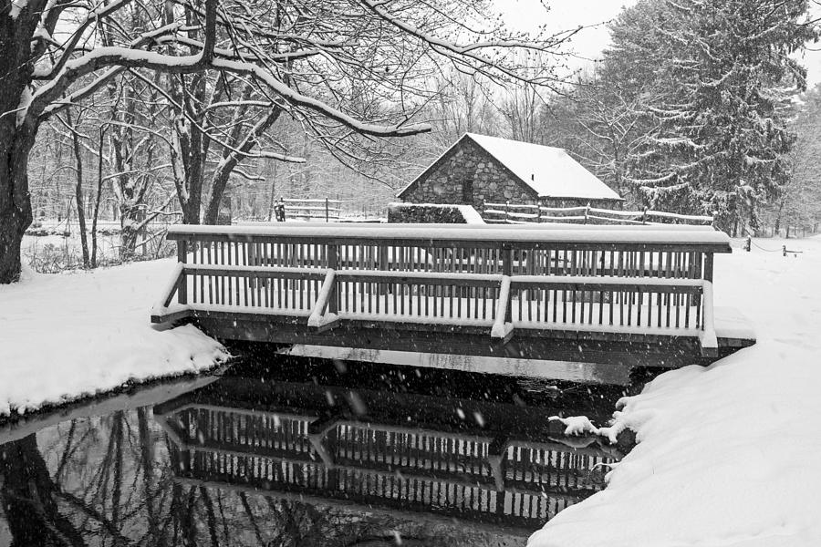 Wayside Inn Grist Mill Covered in Snow Bridge Reflection Black and White Photograph by Toby McGuire