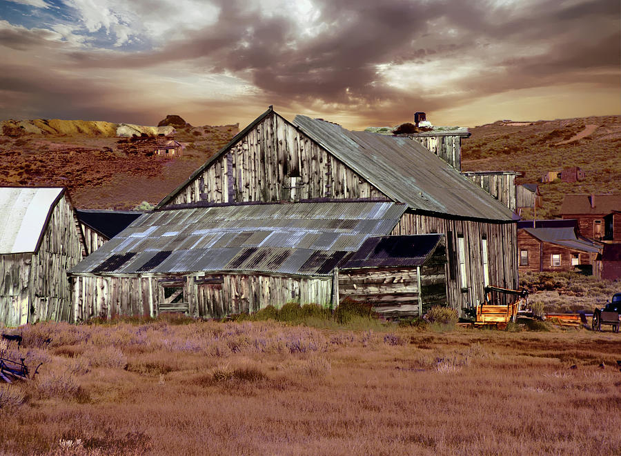 Weathered Barn with Storm Clouds Photograph by Alan Socolik