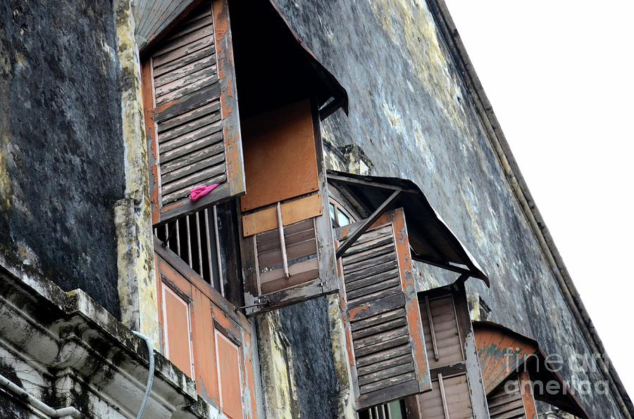 Weathered wooden shutters and windows in old building Georgetown Penang Malaysia Photograph by Imran Ahmed