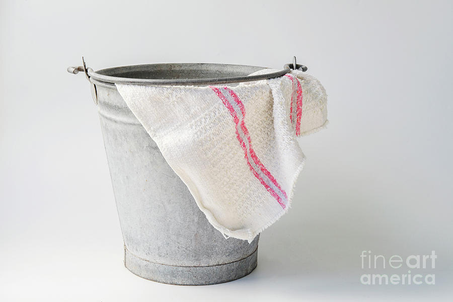 Up Movie Photograph - Weathered zinc bucket with floorcloth by Patricia Hofmeester