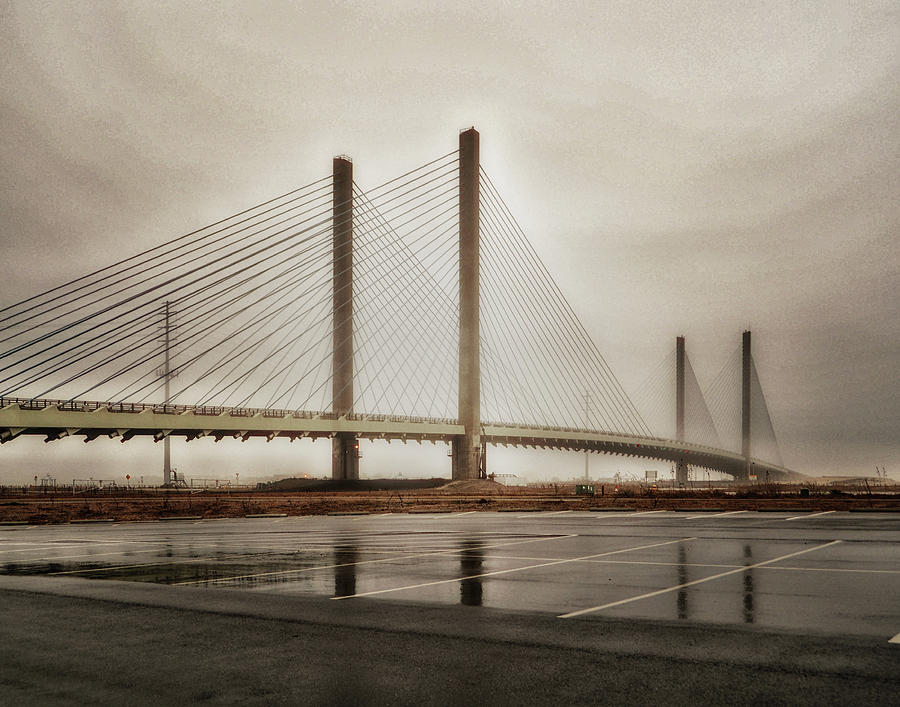 Weathering Weather at the Indian River Inlet Bridge Photograph by Bill Swartwout