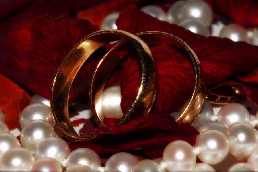 Wedding Bands And Rose Petals Photograph by Tracie Schiebel