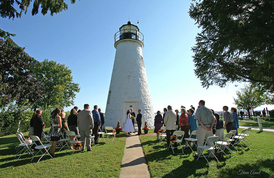 Wedding by the Lighthouse Photograph by Trina Ansel