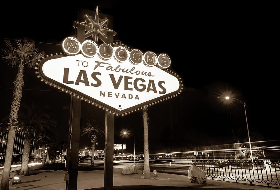 Black And White Photograph - Welcome to Fabulous Las Vegas - Neon Sign in Sepia by Gregory Ballos