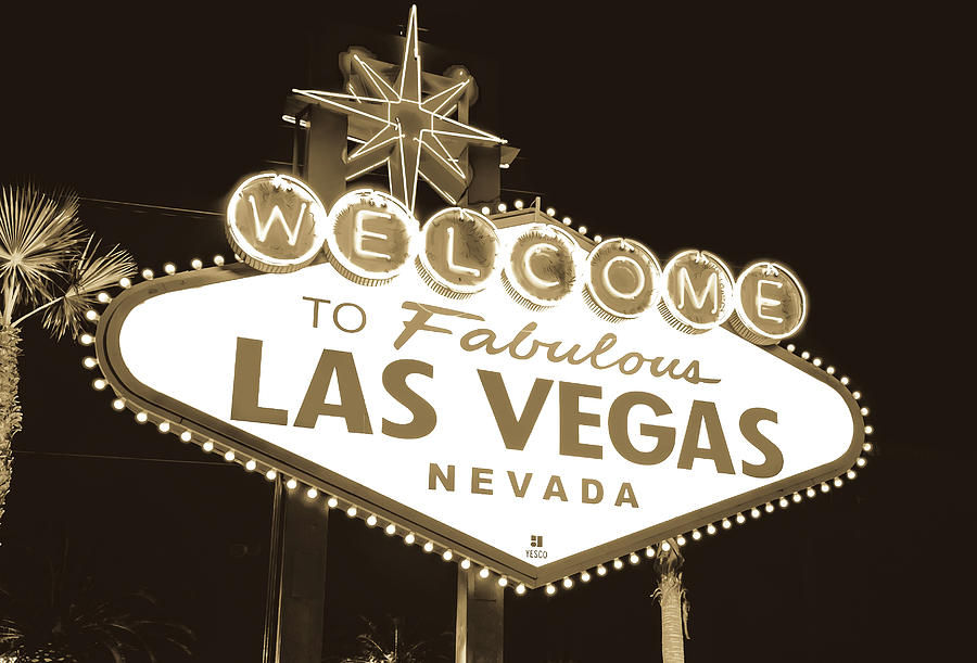 Black And White Photograph - Welcome to Las Vegas Neon Sign in Sepia - Nevada USA by Gregory Ballos