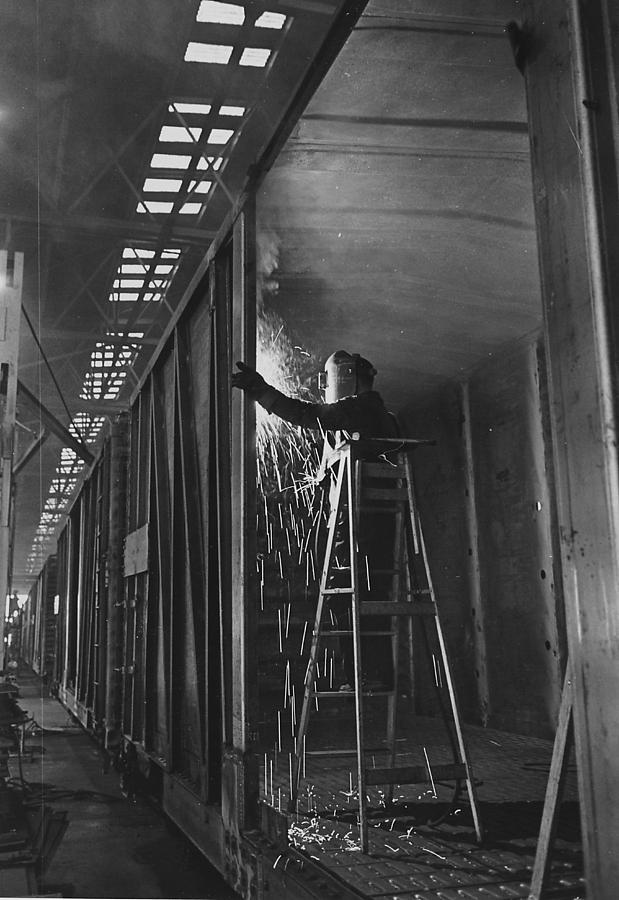 Welder Works on Box Car at Machine Shop Photograph by Chicago and North Western Historical Society