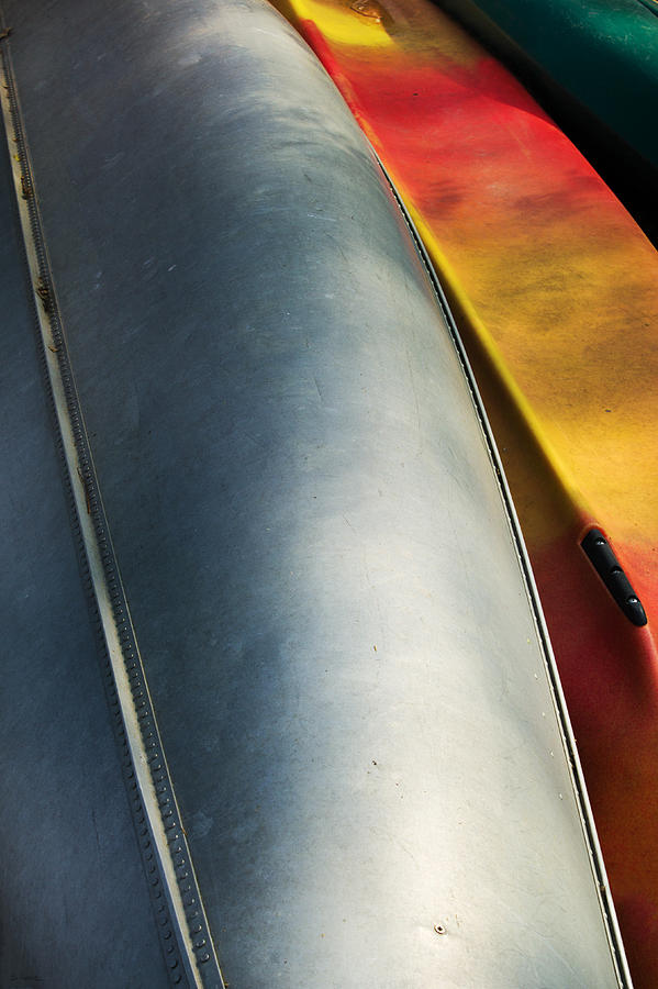 Well Worn Canoes Photograph by Shawna Rowe