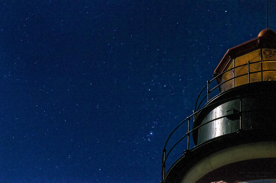 Lighthouse Photograph - West Quoddy Head Lighthouse Beacon Against Starry Sky by Marty Saccone