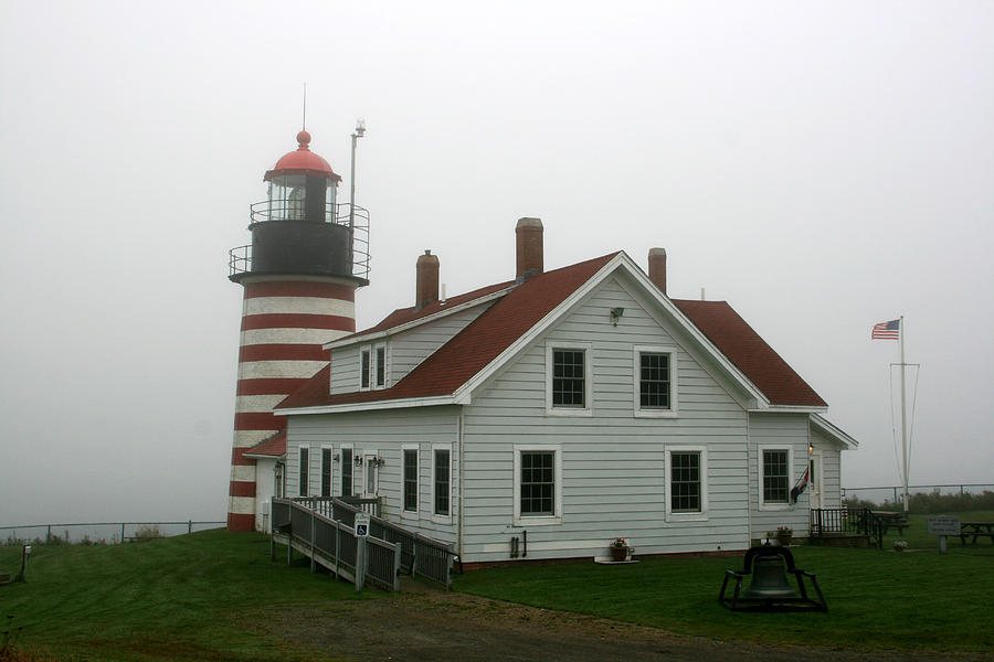 West Quoddy Head Lighthouse in the Fog Photograph by George Jones