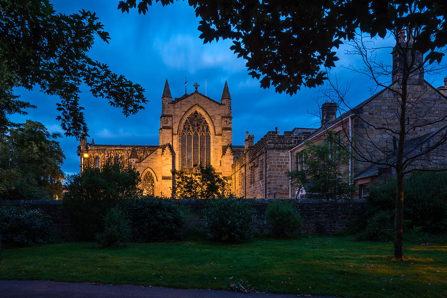 Architecture Photograph - West side of Hexham Abbey at night by David Head