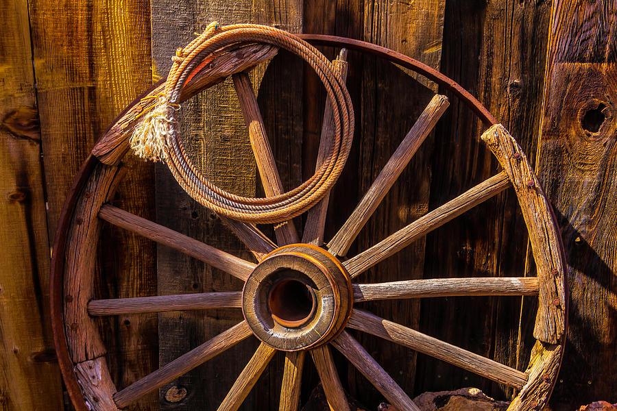 Western Rope And Wooden Wheel Photograph by Garry Gay
