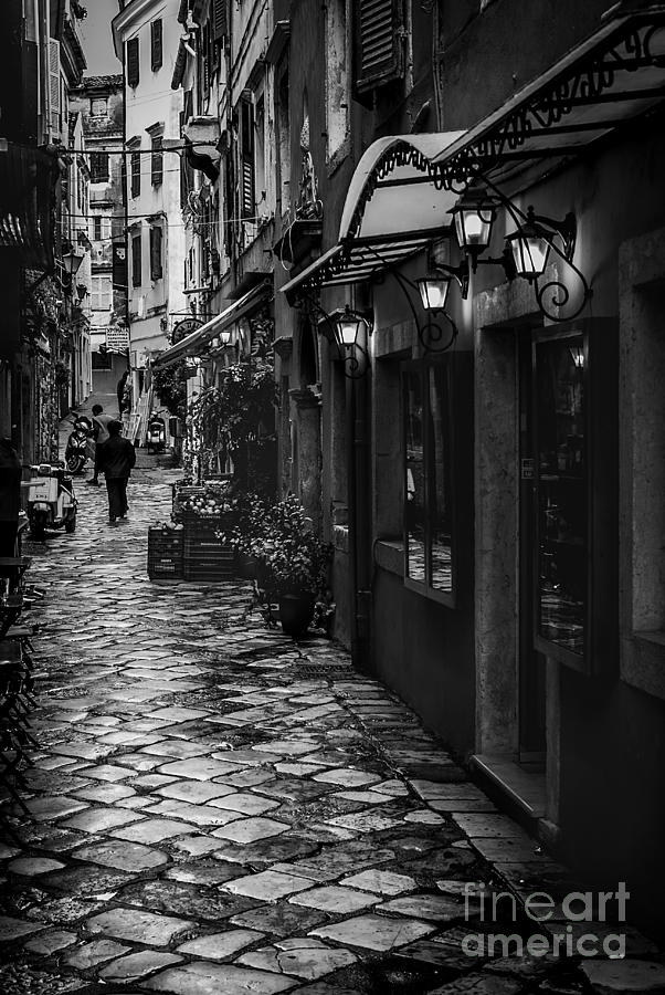 Black And White Photograph - Wet Day in Corfu Town by Paul Woodford