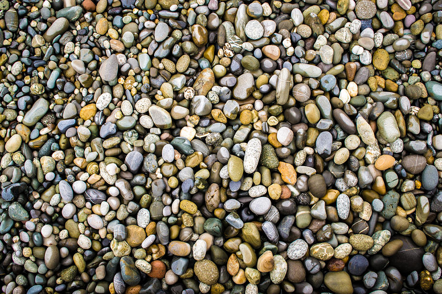 Wet Stones and Pebbles Photograph by John Williams