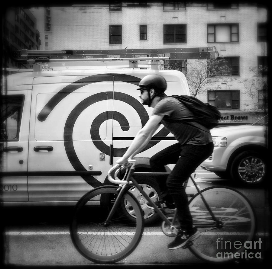 What Goes Around - Man on a Bike Photograph by Miriam Danar