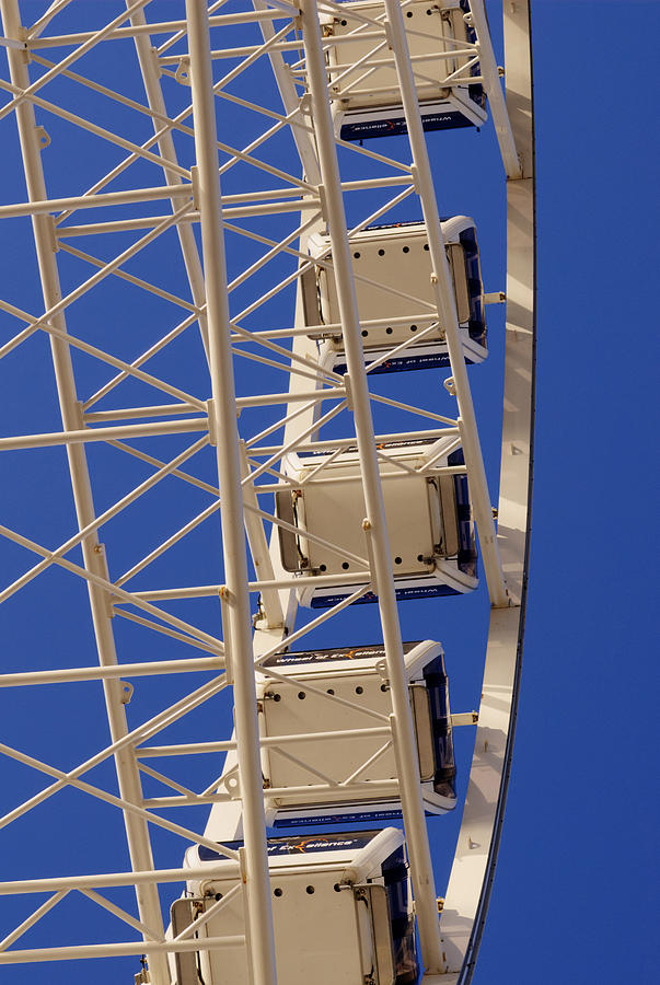 Wheel in the Blue Photograph by Hazy Apple