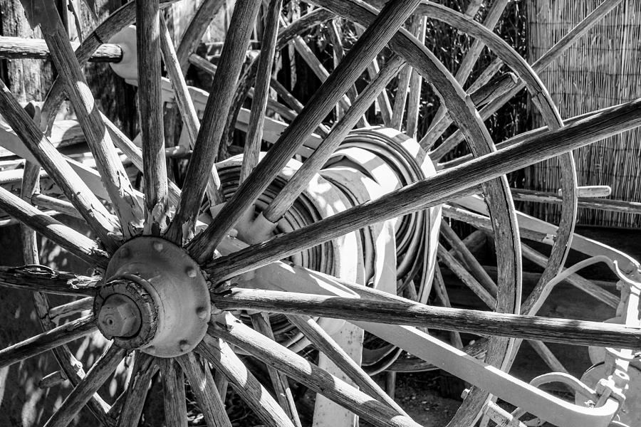 Wheels Abstract 2 Black and White Photograph by Bonnie Follett