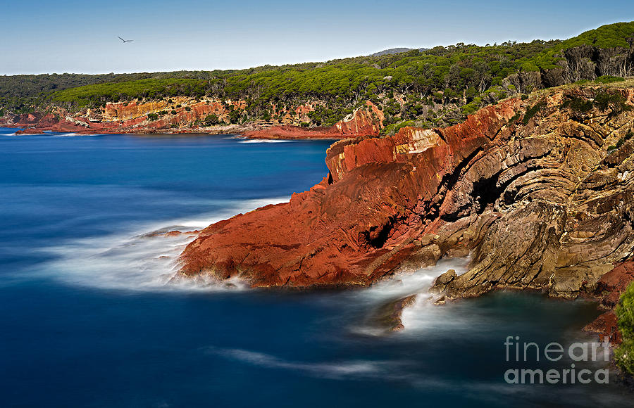 Where Blue Water Meets Red Rock Photograph by Russell Brown
