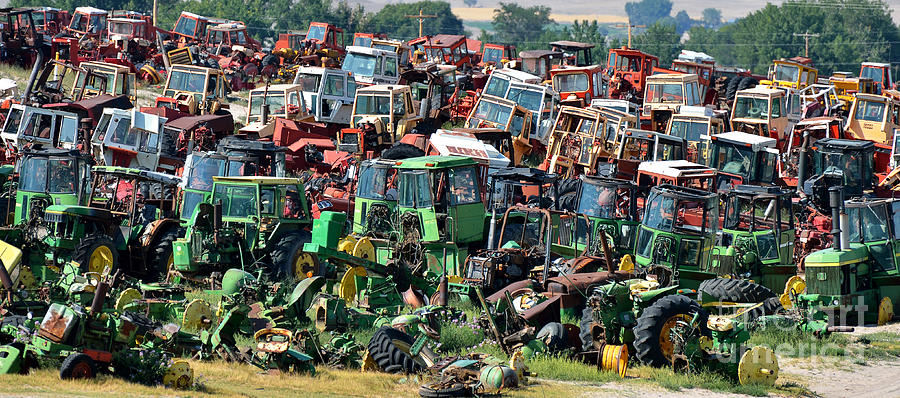 Where Tractors Go to Die Photograph by Ken DePue