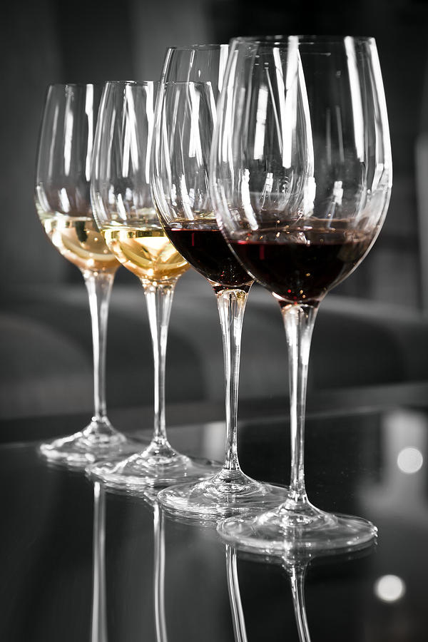 Wine Photograph - White and red wine glasses by Edward Duckitt