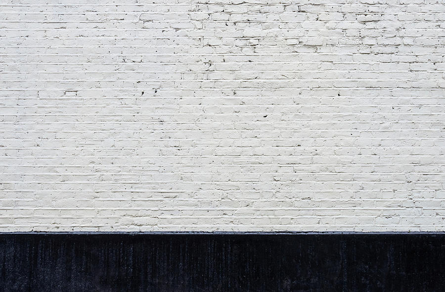 White brick wall and black skirting Photograph by Dutourdumonde Photography