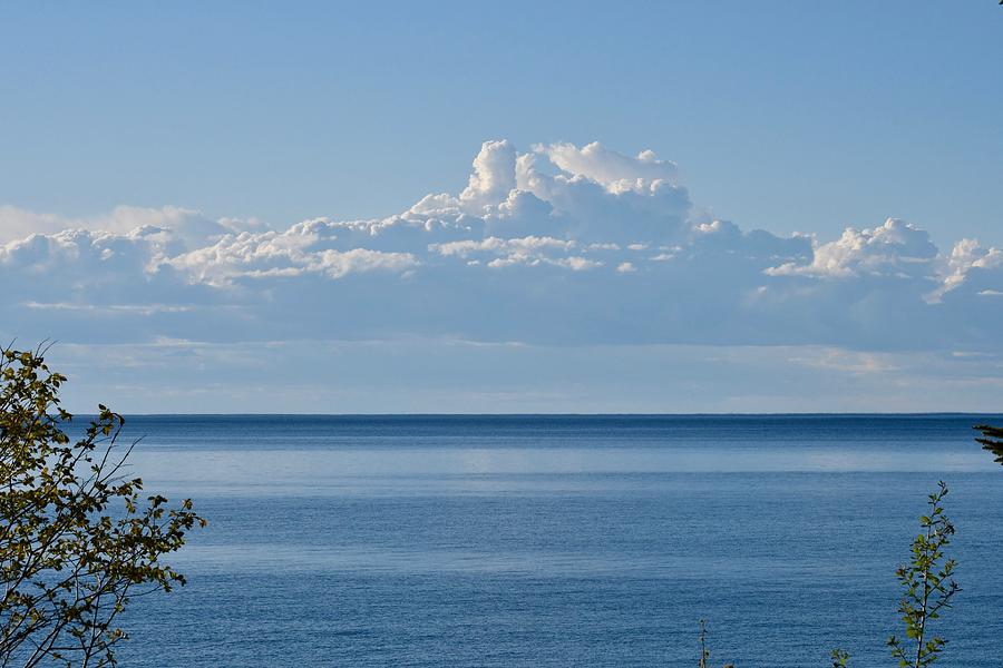 White Cloud on Blue Day Photograph by Hella Buchheim