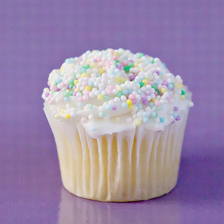Cake Photograph - White Cupcake on Purple by Art Block Collections