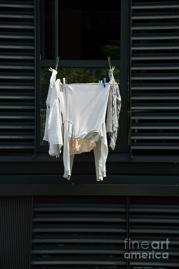 Architecture Photograph - White laundry on black background by Patricia Hofmeester