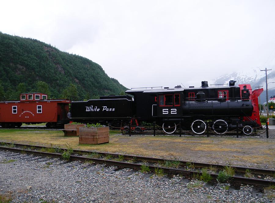 White Pass Engine Coal Car and Caboose Photograph by Warren Thompson