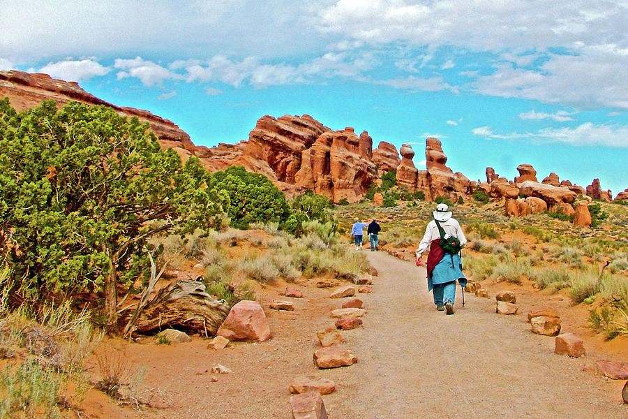 White, Puffy Clouds over Devils Garden Trail in Arches  National Park, Utah Photograph by Ruth Hager