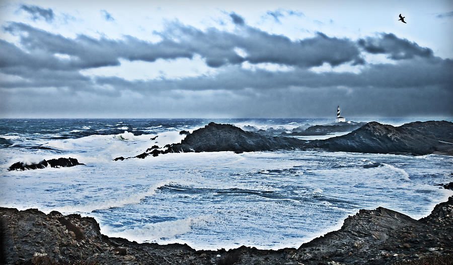 White storm and lighthouse Photograph by Pedro Cardona Llambias