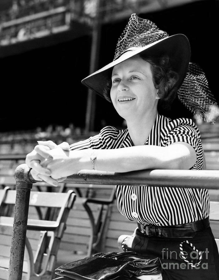 Wife of the The Arkansas Hummingbird Lon Warneke, watches the game from