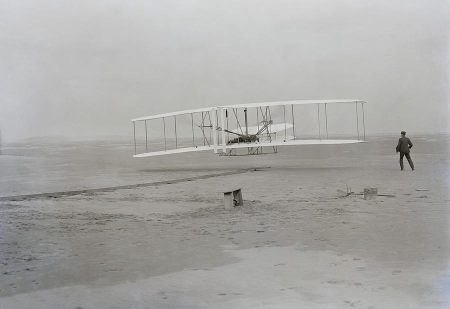 Transportation Photograph - Wilbur Wright Runs Alongside As Orville by Everett