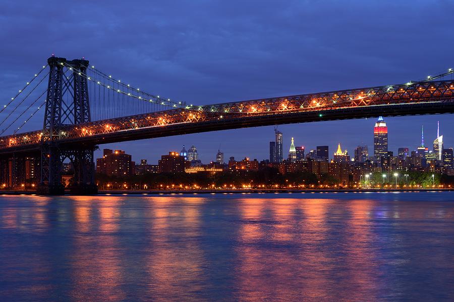 Williamsburg Bridge over the East River in the evening Photograph by ...