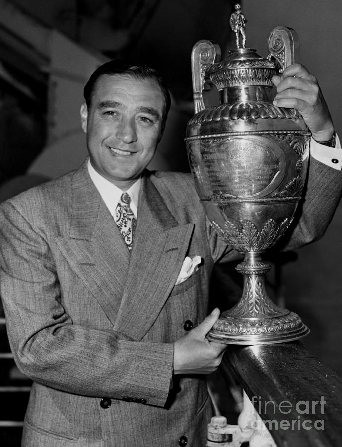 Willie Turnesa showing off his 1947 British Amateur Championship tro image