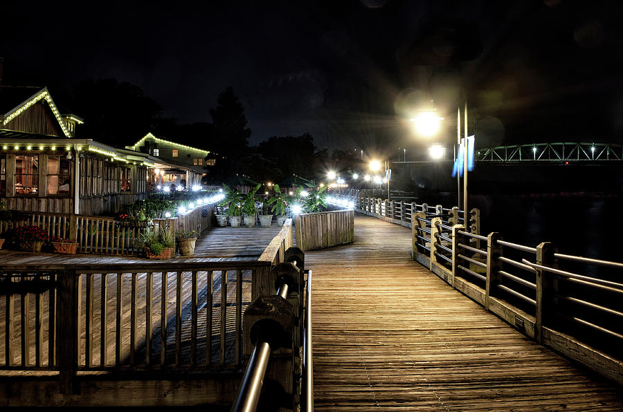Wilmington Riverwalk by night Photograph by Brendan Reals
