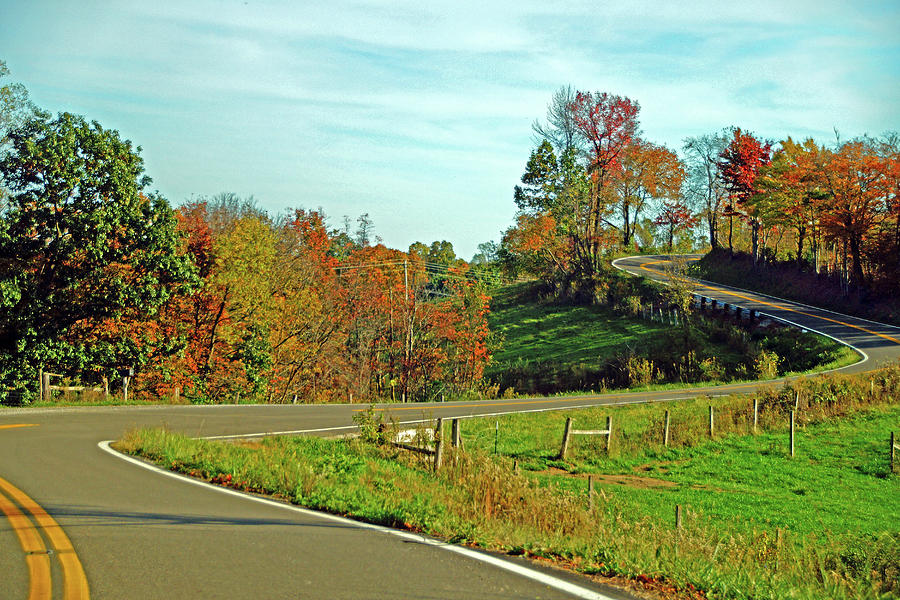 Winding Road in Autumn Photograph by Mike Murdock