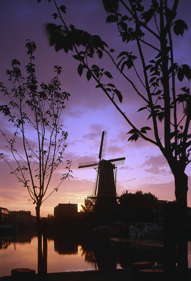 Sunset Photograph - Windmill at sunset by Casper Cammeraat