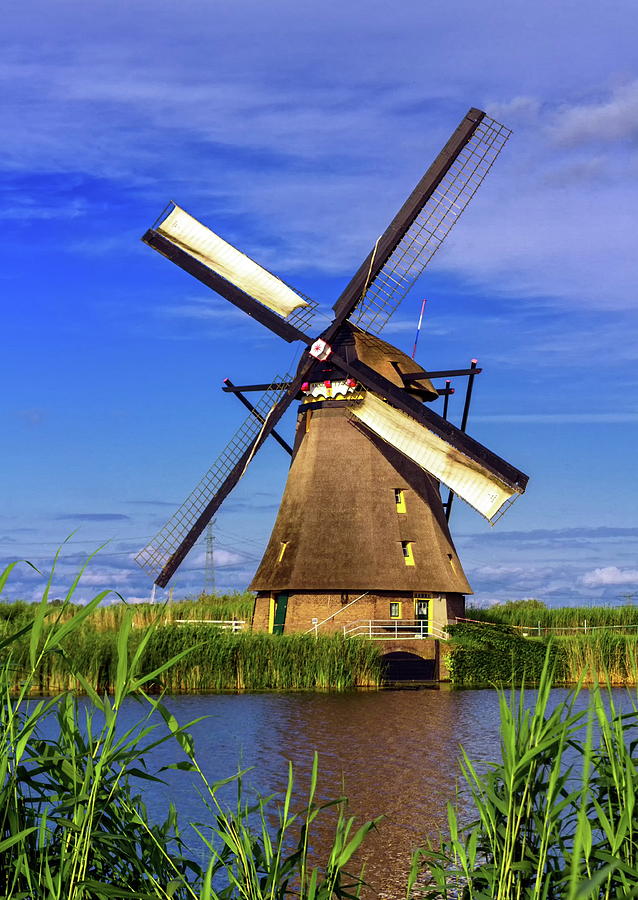 Windmill in Kinderdijk, Holland, Netherlands Photograph by Elenarts - Elena Duvernay photo