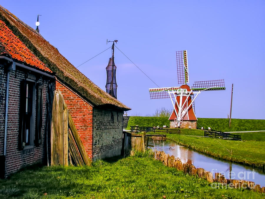 Windmill on Canal Photograph by Rick Bragan