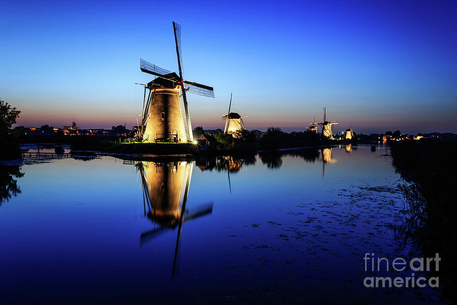 Sunset Photograph - Windmills at dusk in the blue hour by IPics Photography