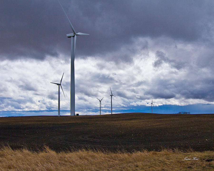 Windmills in Storm Photograph by Jana Rosenkranz