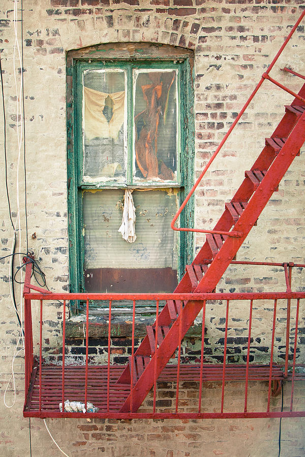 Window and red fire escape Photograph by Gary Heller