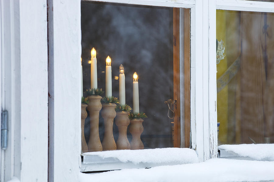 Window with lighted candles Photograph by Ulrich Kunst And Bettina Scheidulin