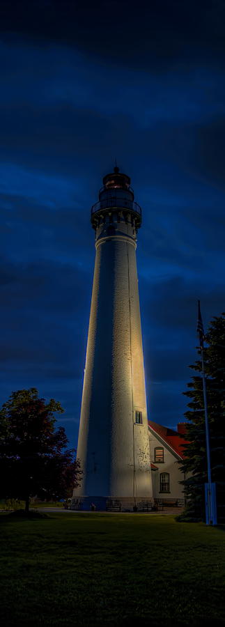 Windpoint Lighthouse Under Lights Photograph by Dale Kauzlaric