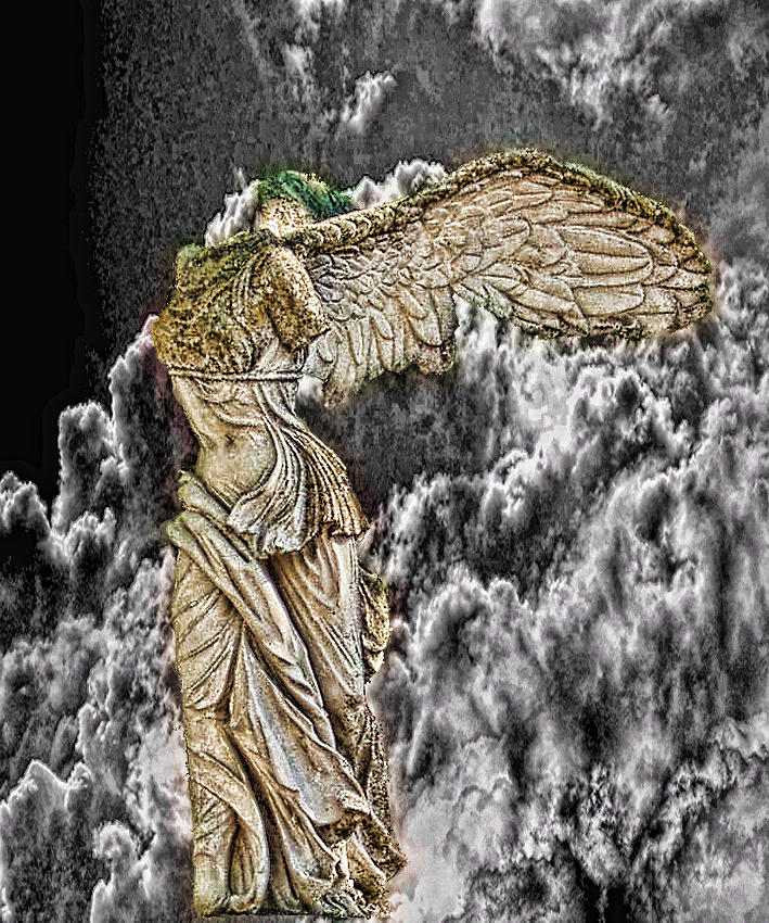 Winged figure Photograph by Angel Jesus De la Fuente